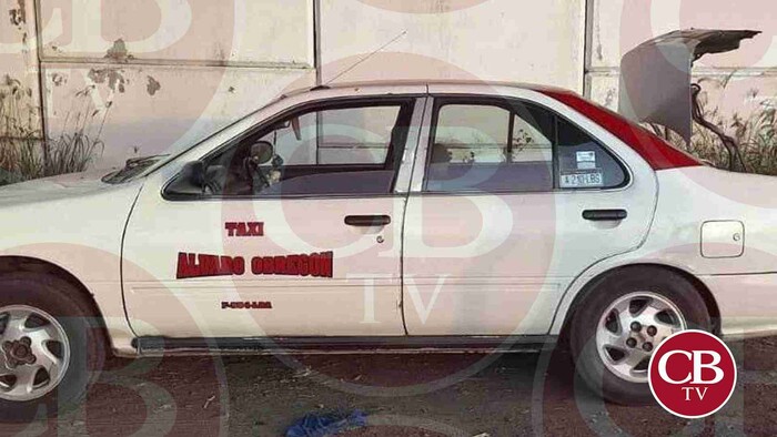 Abandonan ejecutado en la cajuela de un taxi en Álvaro Obregón