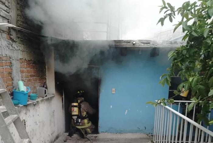Corto circuito provoca incendio al interior de un domicilio en el Centro Histórico de Morelia