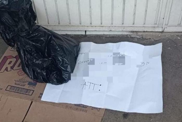 Hallan cabeza de cerdo con mensaje en Uruapan