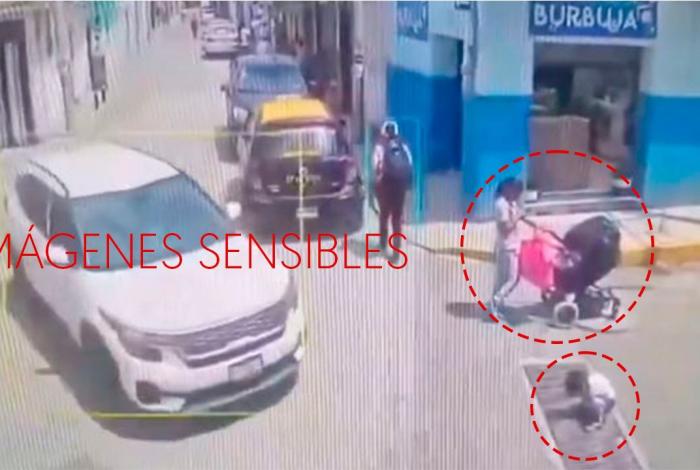 #ImágenesFuertes #Video | Menor que jugaba en la calle, es atropellado frente a su propia madre la cual se encontraba revisando el celular