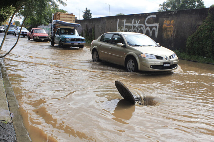 Llovió toda la noche, cayó mucha agua en una Morelia con drenes llenos de basura; lo positivo: sube nivel de la presa