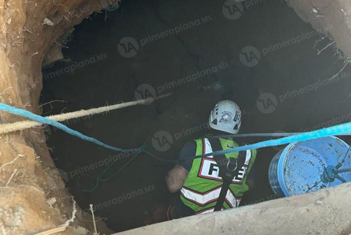 Rescatan a hombres sepultados en pozo de Salvador Escalante; uno no sobrevivió