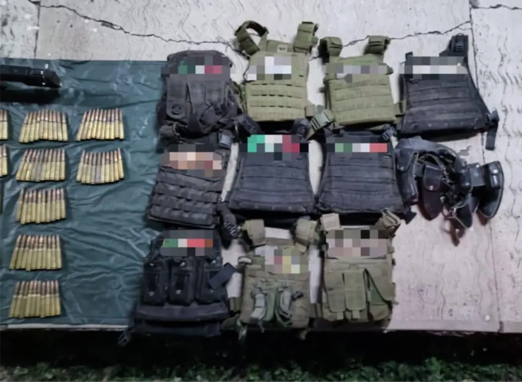 SSP y Defensa aseguran arsenal con barret, ametralladoras y granadas en Aguililla